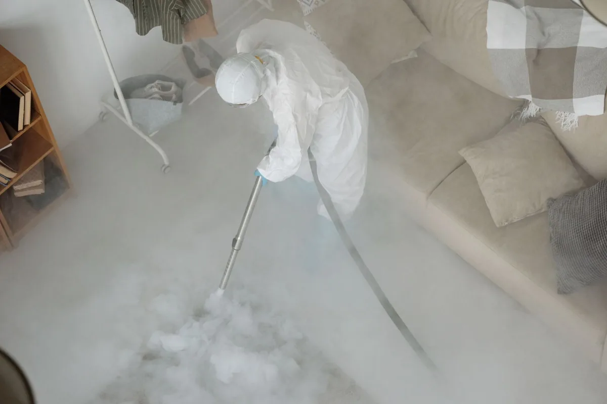Biohazard cleanup technician in protective equipment, Elkton, VA